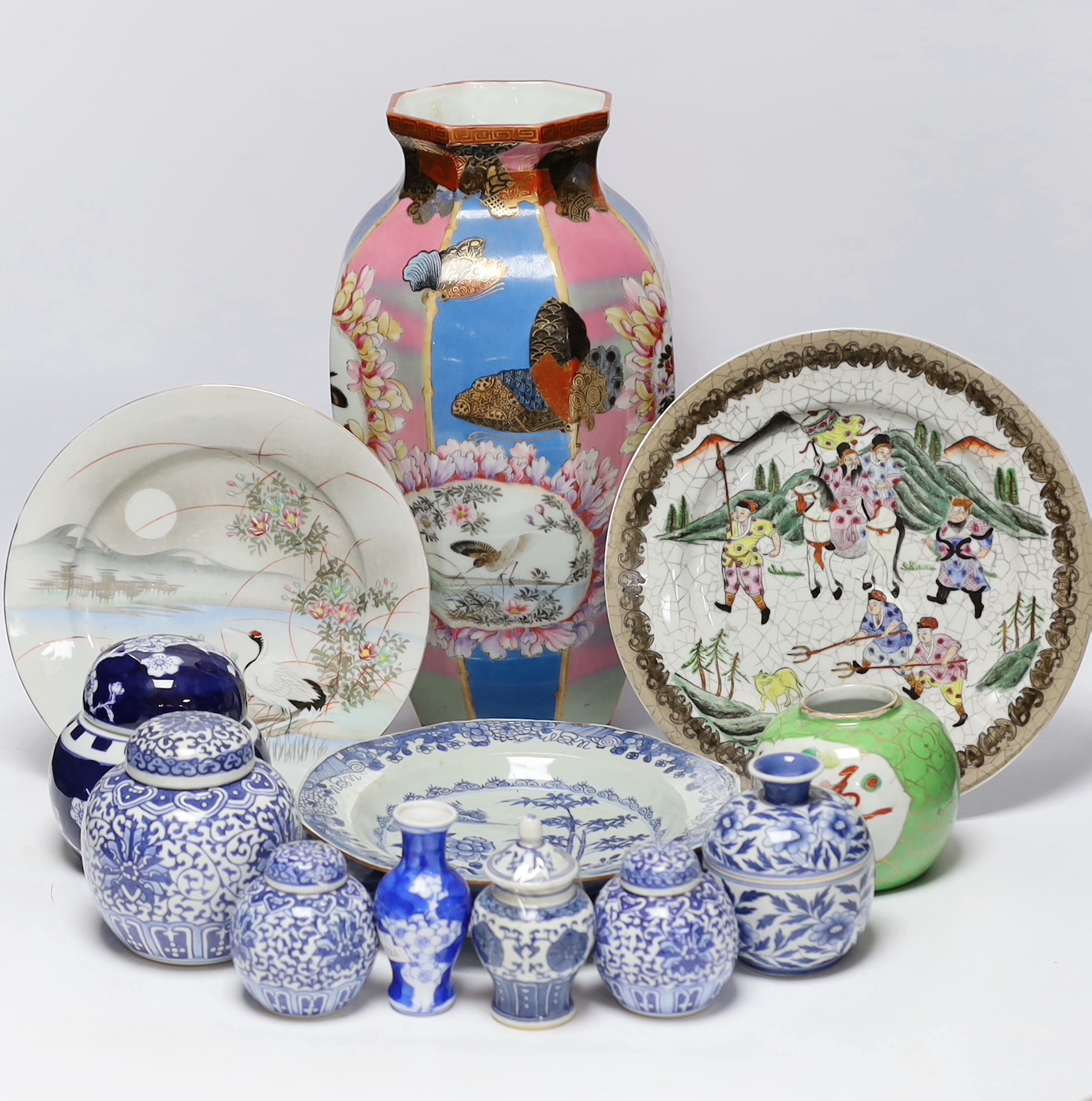 A group of Japanese and Chinese porcelain including an 18th century Chinese export dish, tallest 36cm